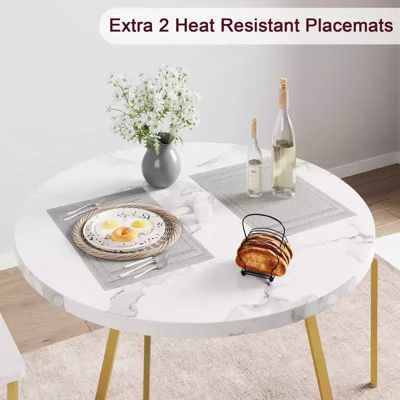 Table et chaises de salle à manger rondes en bois (dont deux chaises en métal et bois)